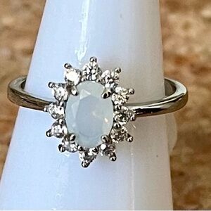 Fragrant Jewels White Opal Halo Ring in Pale Blue and White